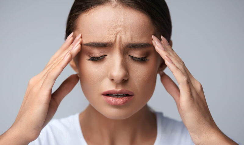 a woman with headache